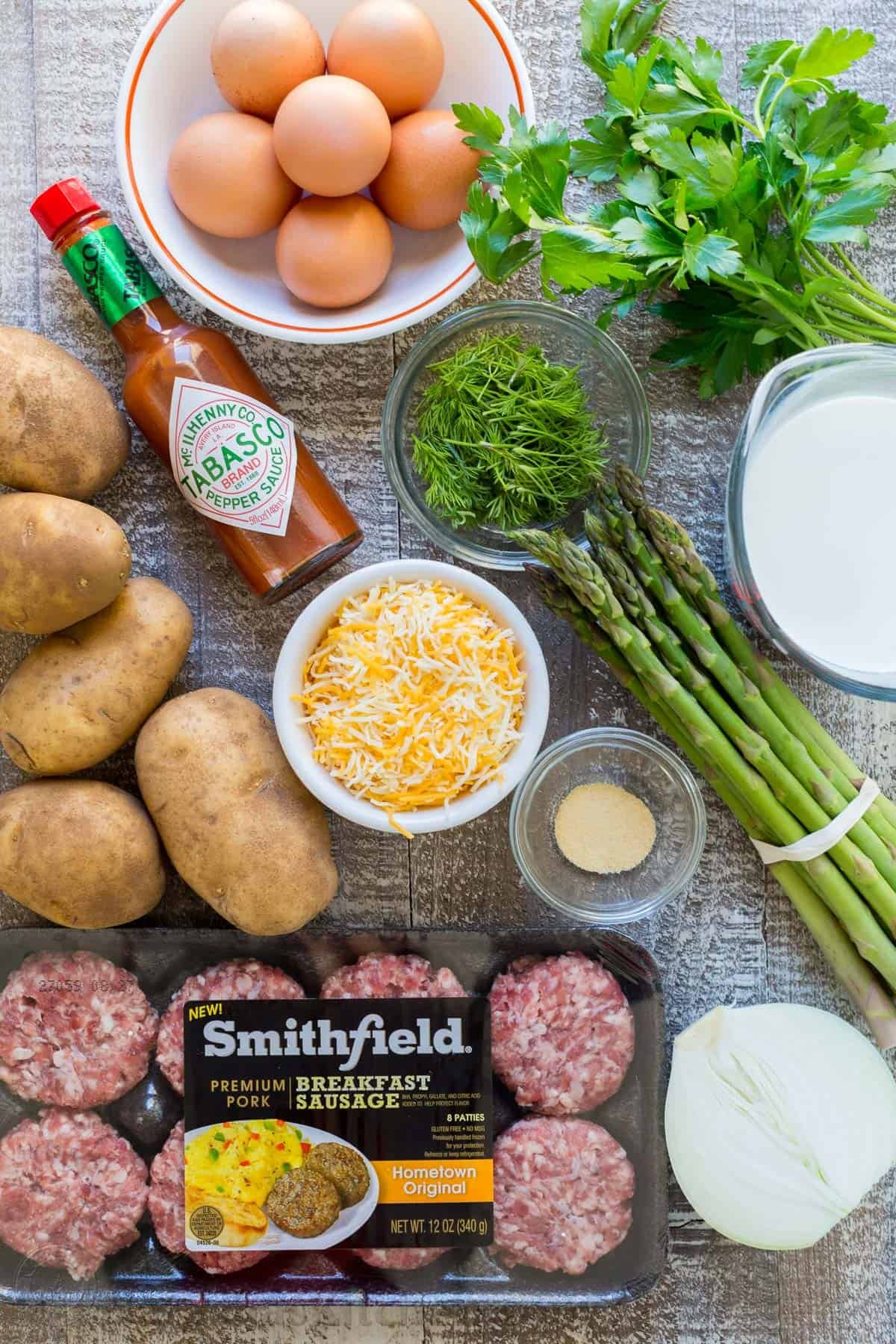 Every bite of this Sausage Asparagus Quiche is pure comfort. This classic quiche recipe is loaded with juicy sausage, eggs, fresh asparagus and herbs. | natashaskitchen.com