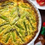 Every bite of this Sausage Asparagus Quiche is pure comfort. This classic quiche recipe is loaded with juicy sausage, eggs, fresh asparagus and herbs. | natashaskitchen.com