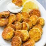 Fried Zucchini Crisps on platter served with dipping sauce