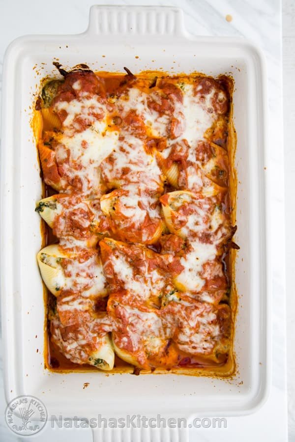 These lasagna stuffed shells are easier than making lasagna but are just as satisfying! @natashaskitchen