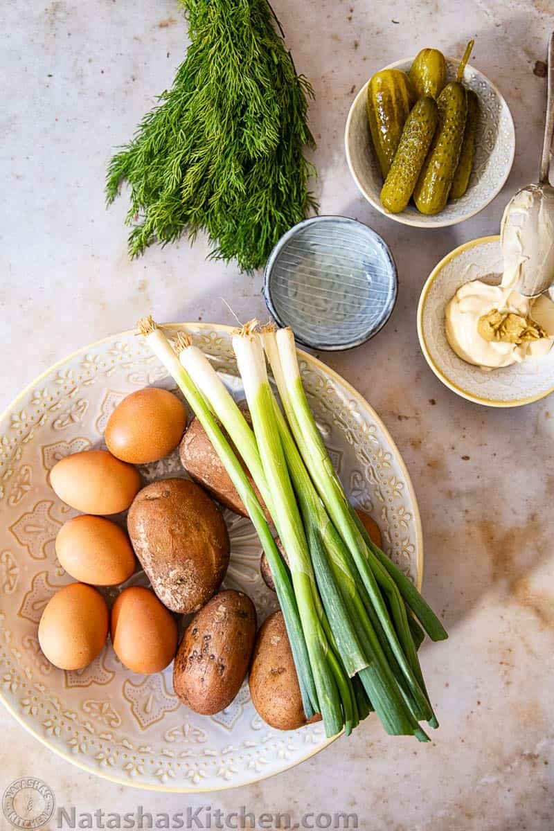 Potato salad ingredients. Potatoes, eggs, green onions, dill