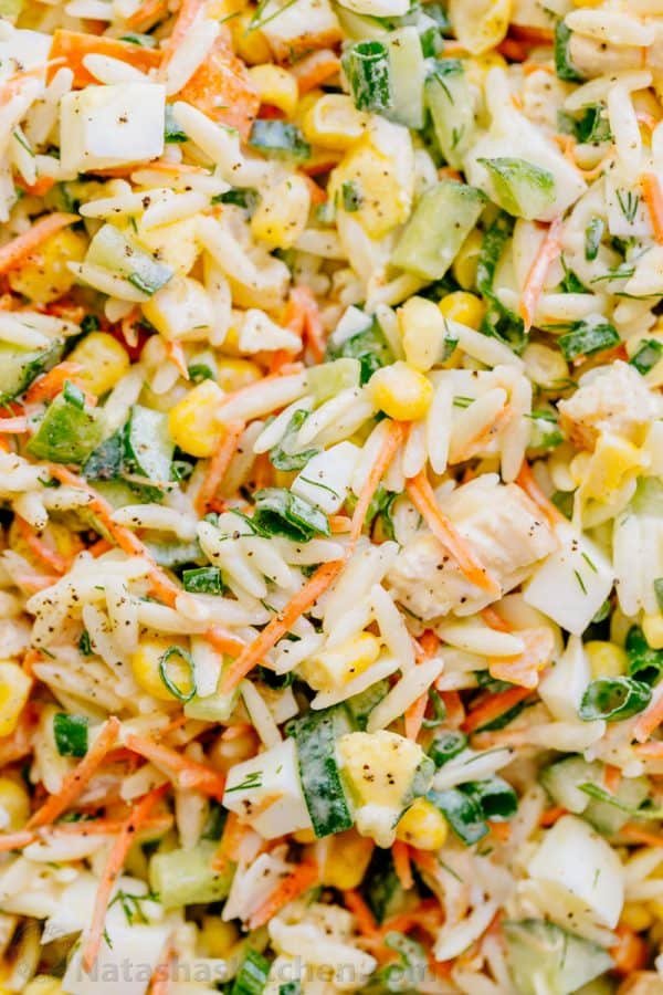 This chicken pasta salad is loaded, hearty and satisfying. The creamy lemon dill dressing adds fresh amazing flavor. This pasta salad is so tasty! | natashaskitchen.com