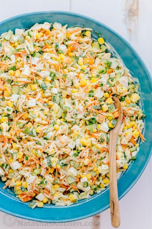 This chicken pasta salad is loaded, hearty and satisfying. The creamy lemon dill dressing adds fresh amazing flavor. This pasta salad is so tasty! | natashaskitchen.com