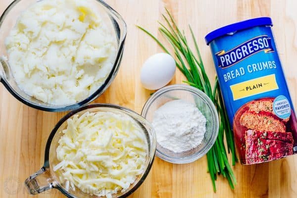 Cheesy mashed potato pancakes recipe - best way to use up leftover mashed potatoes! Mashed Potato Pancakes are crispy outside and loaded with melty cheese! | natashaskitchen.com