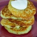 These potato pancakes have finely grated, raw potatoes and onion. It's a classic Ukrainian dish called Deruny. Our moms still make these deruny regularly.