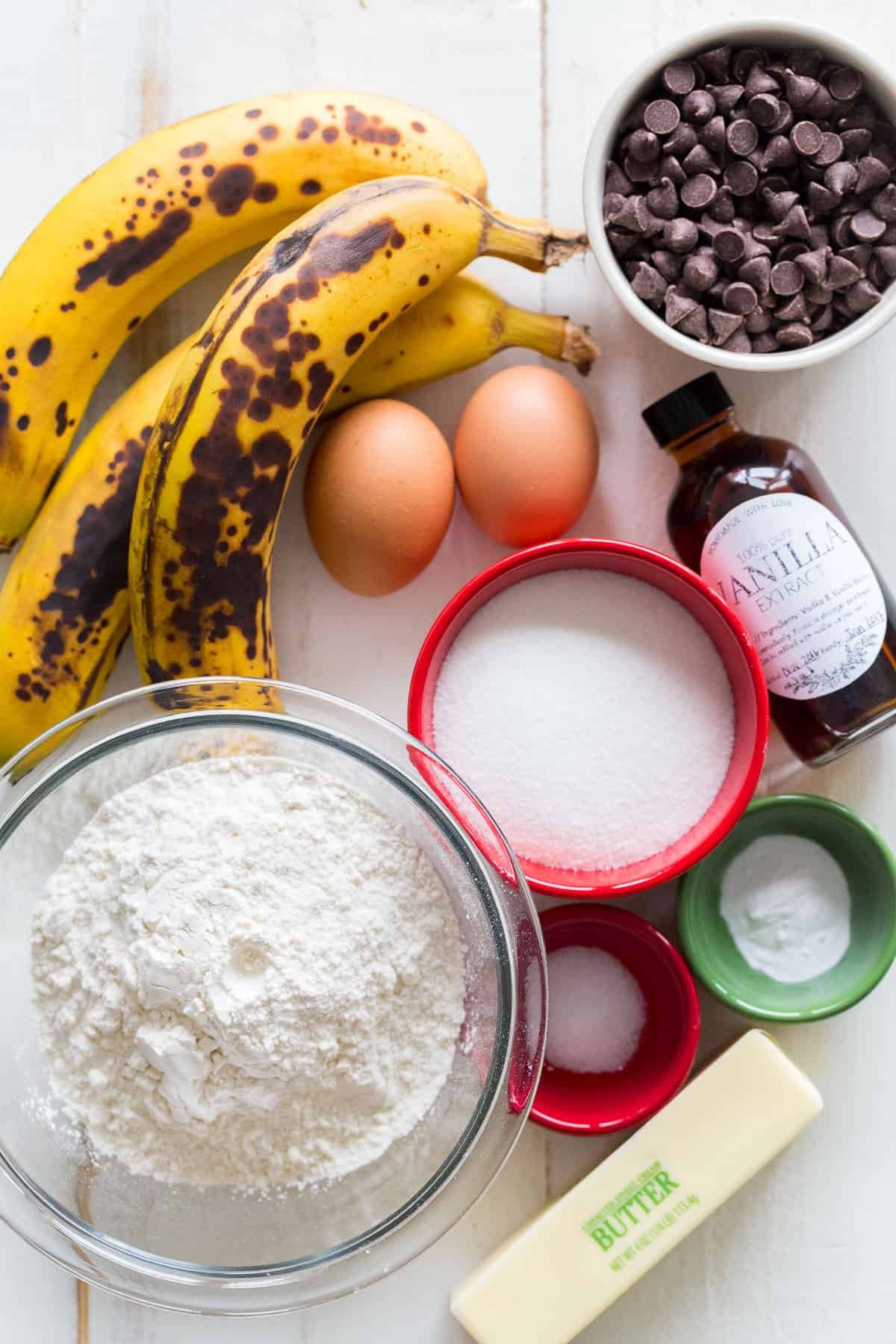 Ingredients for Chocolate Chip Banana Bread with over-ripe bananas and chocolate chips