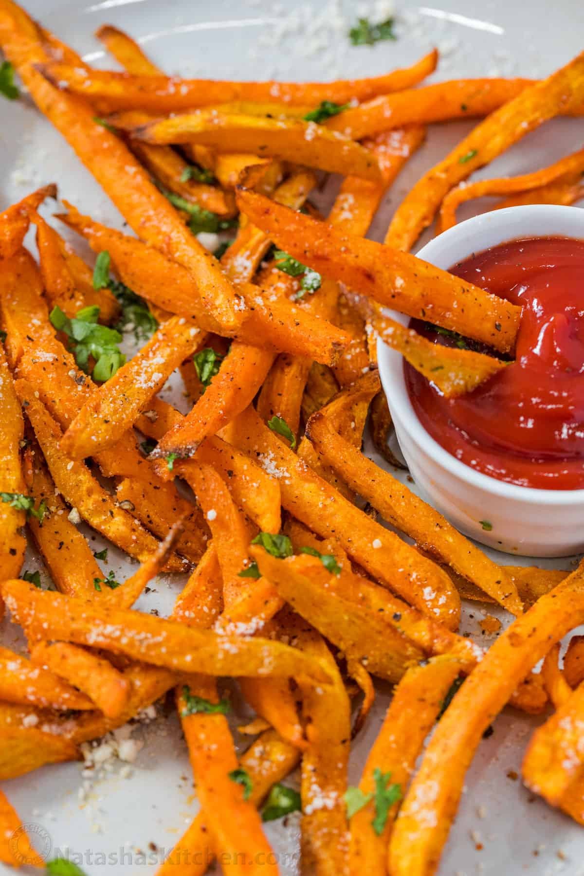 Air Fryer Sweet potato fries served with ketchup dipping sauce