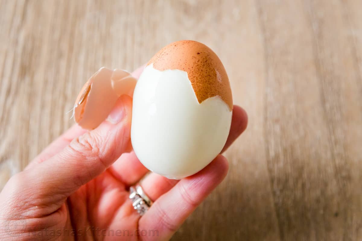 Learn how to make Hard Boiled Eggs and Soft Boiled Eggs. Everyone needs a go-to method for making perfectly cooked eggs every time and it's really easy. #hardboiledeggs #howtopeeleggs #boiledeggs #natashaskitchen Peeling a boiled egg