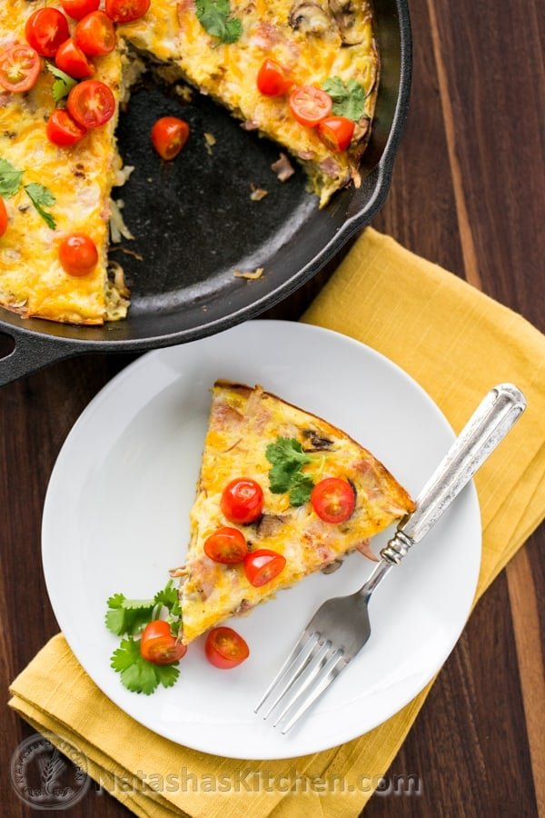 Cheesy Hash Brown and Egg Casserole. Easy one-pan breakfast for your family or guests! @NatashasKitchen