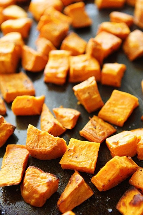 Roasted Sweet Potato Pomegranate Salad Recipe on twopeasandtheripod.com. Love this quick and easy salad!