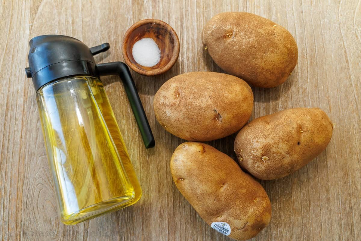 My easy Air Fryer Baked Potato recipe makes the best Baked Potatoes. You'll love the crispy skin with a soft and fluffy center in less time! Ingredients for Air fryer baked potato