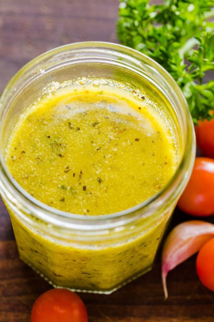 Homemade Italian dressing in a mason jar ready to be stored in refrigerator