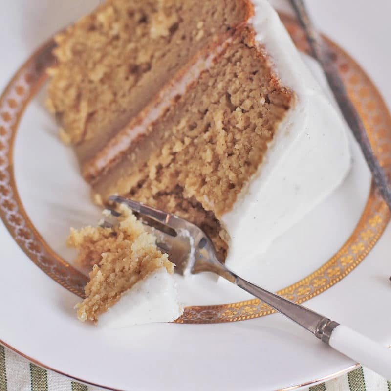 This Healthy Gluten-Free Vanilla Bean Cake is super moist and topped with a sweet and Vanilla Bean Frosting, it doesn't taste low fat and sugar free at all!