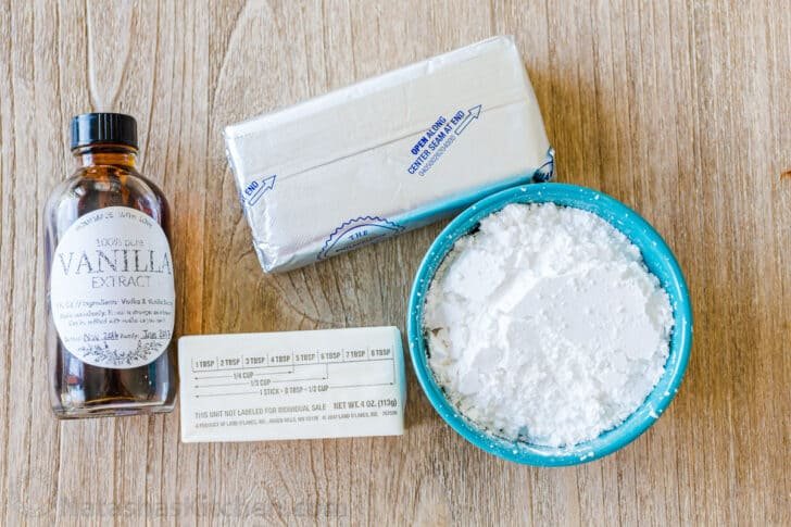 Ingredients for Cinnamon Roll Icing Ingredients for cinnamon roll icing with cream cheese, butter, powdered sugar and vanilla