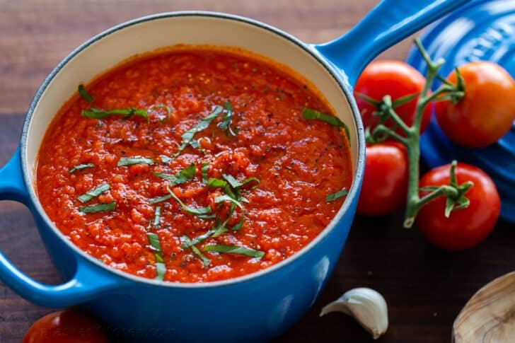 This Baked Eggplant Parmesan recipe fills your mouth with crisp eggplant, flavorful marinara, and plenty of melted cheese to replicate a classic Italian dish Delicious homemade marinara sauce garnished with fresh basil