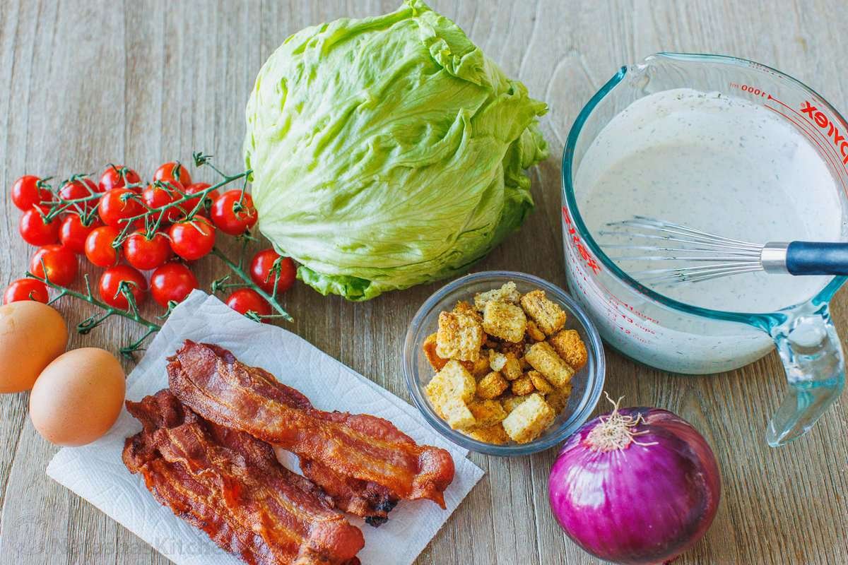 This restaurant-style Garden Salad is an easy salad recipe full of fresh ingredients and tossed with tangy homemade buttermilk dressing. The ingredients for easy garden salad.