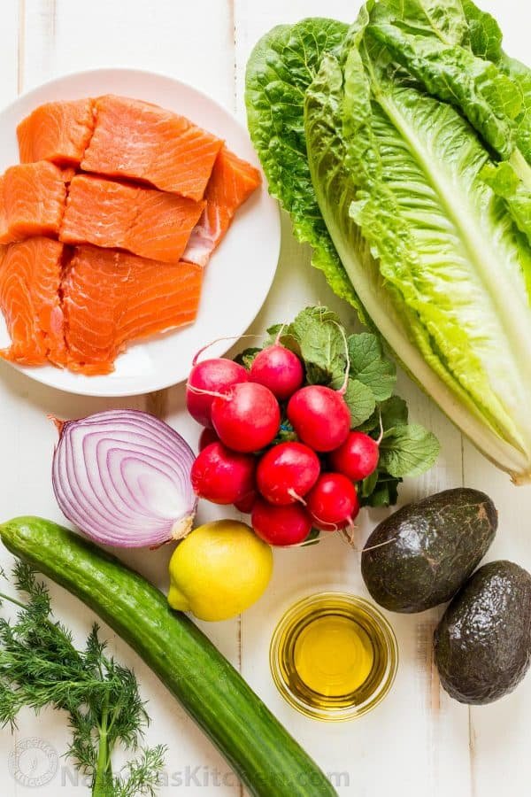 This avocado salmon salad recipe is loaded with all of the best salad ingredients; crisp cucumber and lettuce, and juicy pan seared salmon. The lemon dill dressing is so easy and gives this salmon salad amazing fresh flavor. 