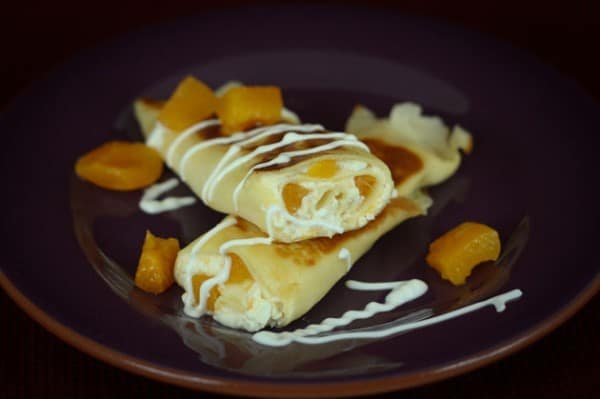 Pineapple here is sweet and tart; a perfect complement to the cheese filling in these nalesniki. Enjoy nalesniki topped with sour cream or favorite jam.
