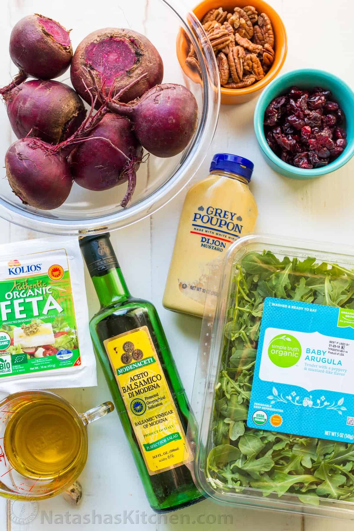 Ingredients to make beet salad with arugula and balsamic vinaigrette Ingredients for beet salad: beets, pecans, feta, arugula, olive oil, balsamic vinegar, Grey Poupon dijon mustard, salt and pepper