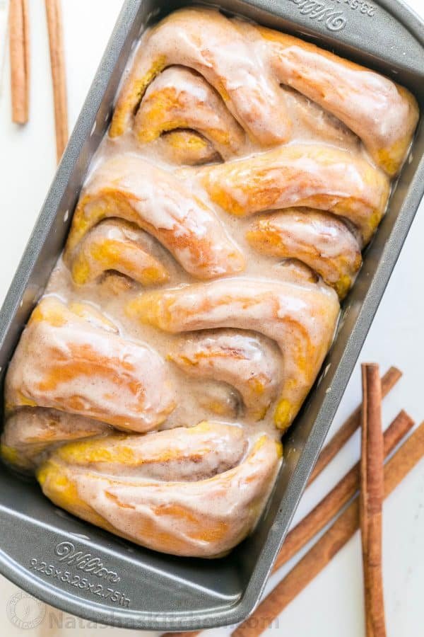 You'll make this Pumpkin Bread over and over. Cinnamon rolls + pumpkin pie + amazing cinnamon glaze = this pull-apart pumpkin bread! It melts in your mouth! | natashaskitchen.com