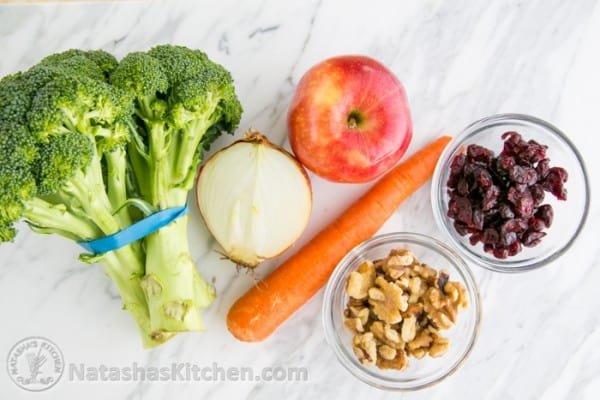 Broccoli Salad Ingredients with broccoli, apple, carrots, onion, nuts, craisins