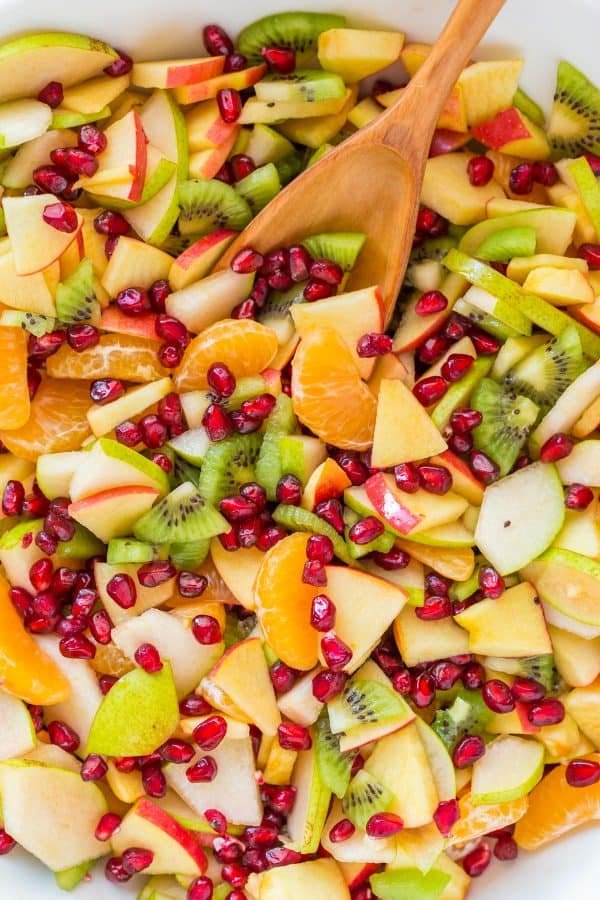 Winter fruit salad is refreshing and loaded with the best fruits of winter. The lemon-lime-honey syrup is lip-smacking good! You'll be running for refills! | natashaskitchen.com