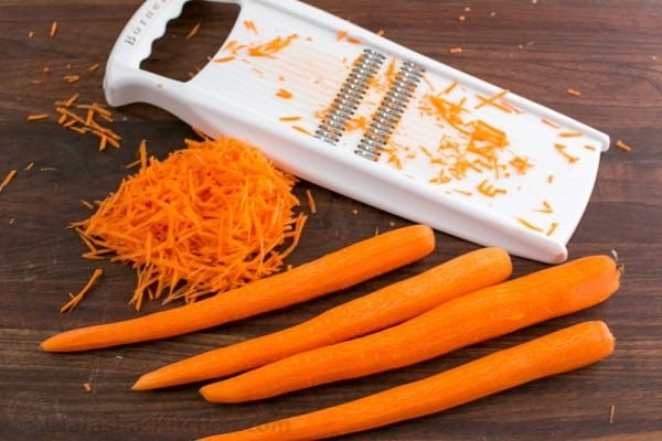 A simple and tasty carrot salad studded with apricots and pecans. The dressing in this carrot salad is delicious - you'll want it on all of your salads! 