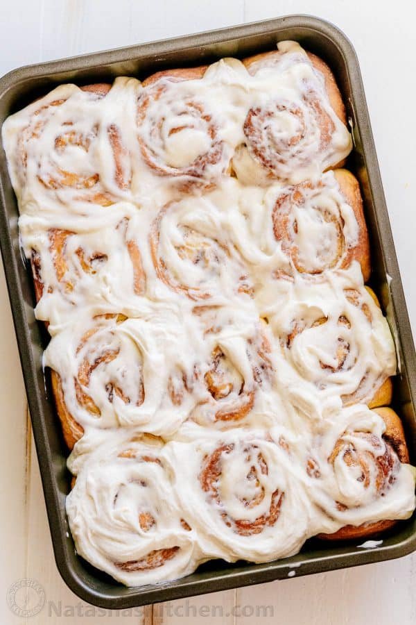 Melt-in-you-mouth overnight cinnamon rolls with whipped cream cheese icing. Perfect for holidays and busy mornings. The best make-ahead cinnamon rolls! | natashaskitchen.com