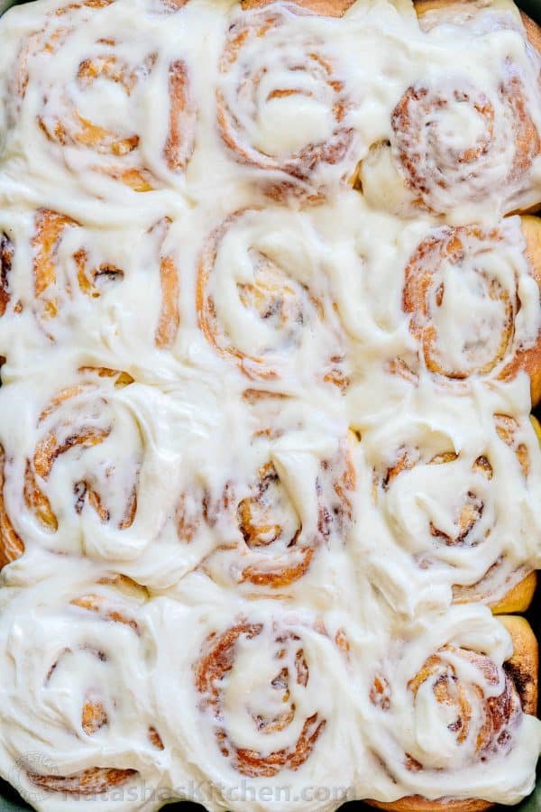 Melt-in-you-mouth overnight cinnamon rolls with whipped cream cheese icing. Perfect for holidays and busy mornings. The best make-ahead cinnamon rolls! | natashaskitchen.com