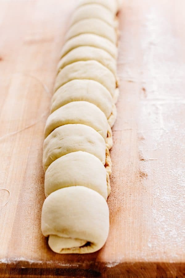 Melt-in-you-mouth overnight cinnamon rolls with whipped cream cheese icing. Perfect for holidays and busy mornings. The best make-ahead cinnamon rolls! | natashaskitchen.com