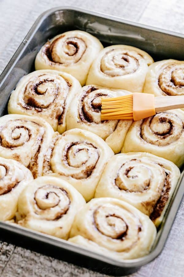 Melt-in-you-mouth overnight cinnamon rolls with whipped cream cheese icing. Perfect for holidays and busy mornings. The best make-ahead cinnamon rolls! | natashaskitchen.com
