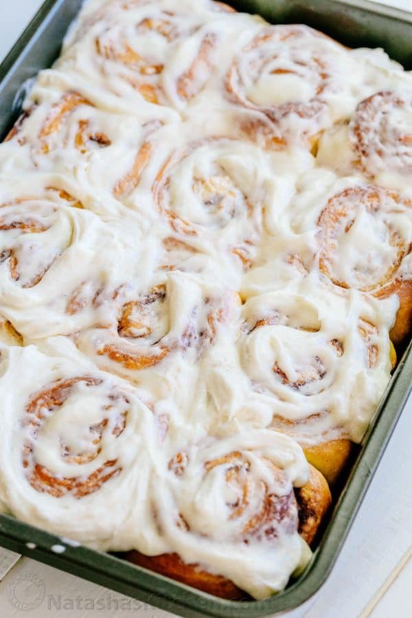 Melt-in-you-mouth overnight cinnamon rolls with whipped cream cheese icing. Perfect for holidays and busy mornings. The best make-ahead cinnamon rolls! | natashaskitchen.com