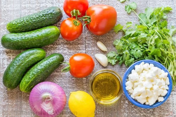 This Cucumber Tomato Feta Salad has simple ingredients that are a winning combination. Refreshing and flavorful! A new favorite cucumber tomato feta salad! | natashaskitchen.com
