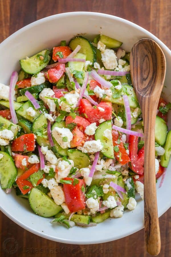 This Cucumber Tomato Feta Salad has simple ingredients that are a winning combination. Refreshing and flavorful! A new favorite cucumber tomato feta salad! | natashaskitchen.com