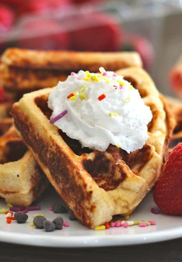These Healthy Gluten-Free Waffles are SUPER soft, fluffy, moist, and sweet! You'd never know this recipe is sugar free, low carb, low fat, and high protein.