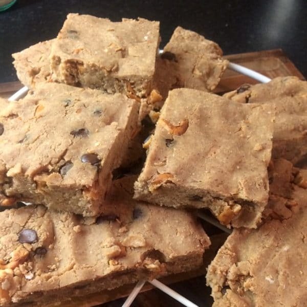 Unlike Ben & Jerry's Chubby Hubby ice cream, these Healthy Chubby Hubby DIY Protein Bars are low in sugar, high in protein and high in fiber! They're easy to make, totally craving-worthy, and 100% healthy. Indulge in this peanut butter-chocolate-pretzel combo, guilt-free!