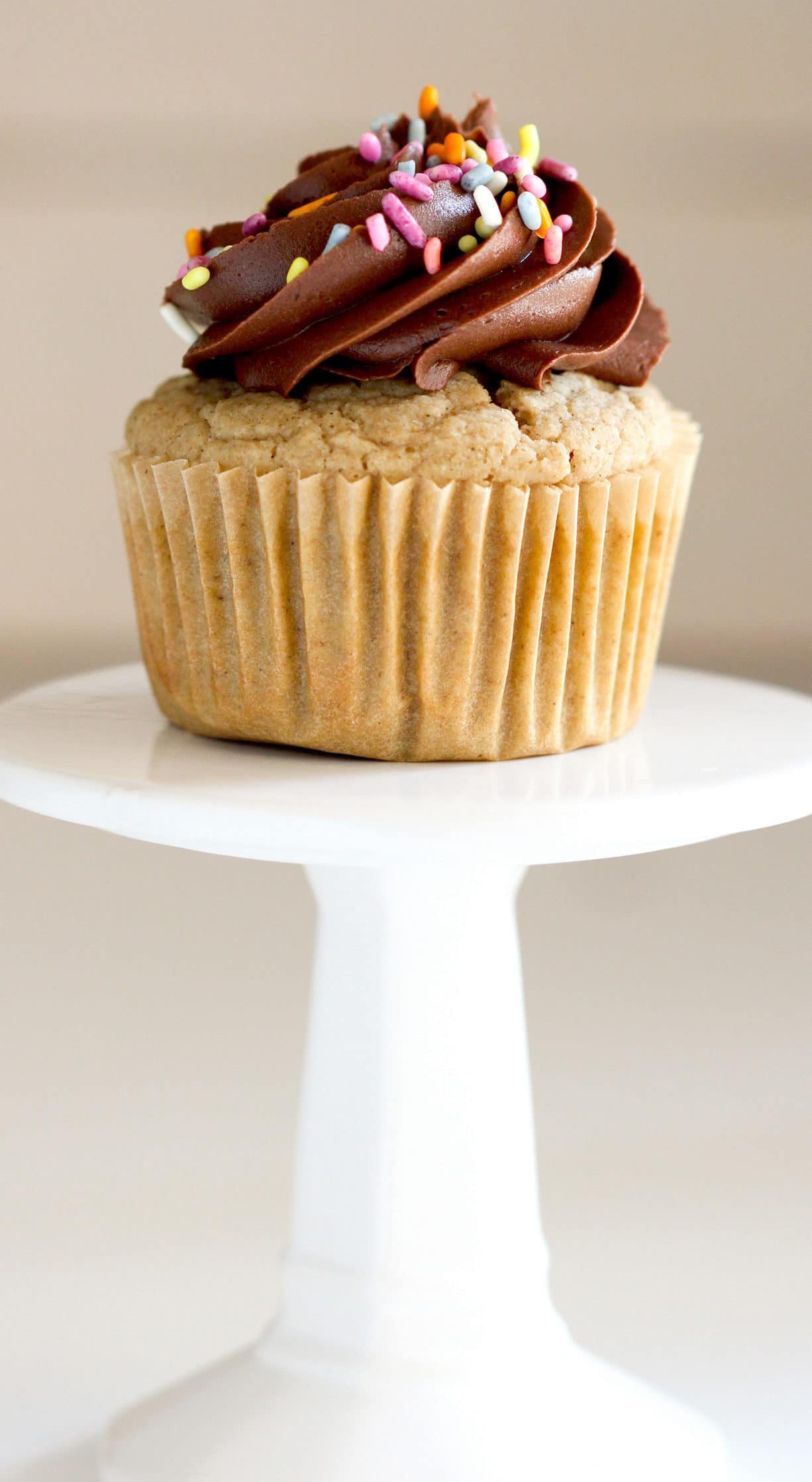 These Healthy Gluten-Free Vanilla Cupcakes will restore your faith in gluten-free baked goods! They're soft, fluffy, moist, and sweet with comforting tones of vanilla bean in every bite. You’d never know these are sugar free, low fat, gluten free, and just 90 calories per cupcake! Healthy Dessert Recipes with sugar free, low calorie, low fat, low carb, high protein, gluten free, dairy free, vegan, and raw options at the Desserts With Benefits Blog (www.DessertsWithBenefits.com)