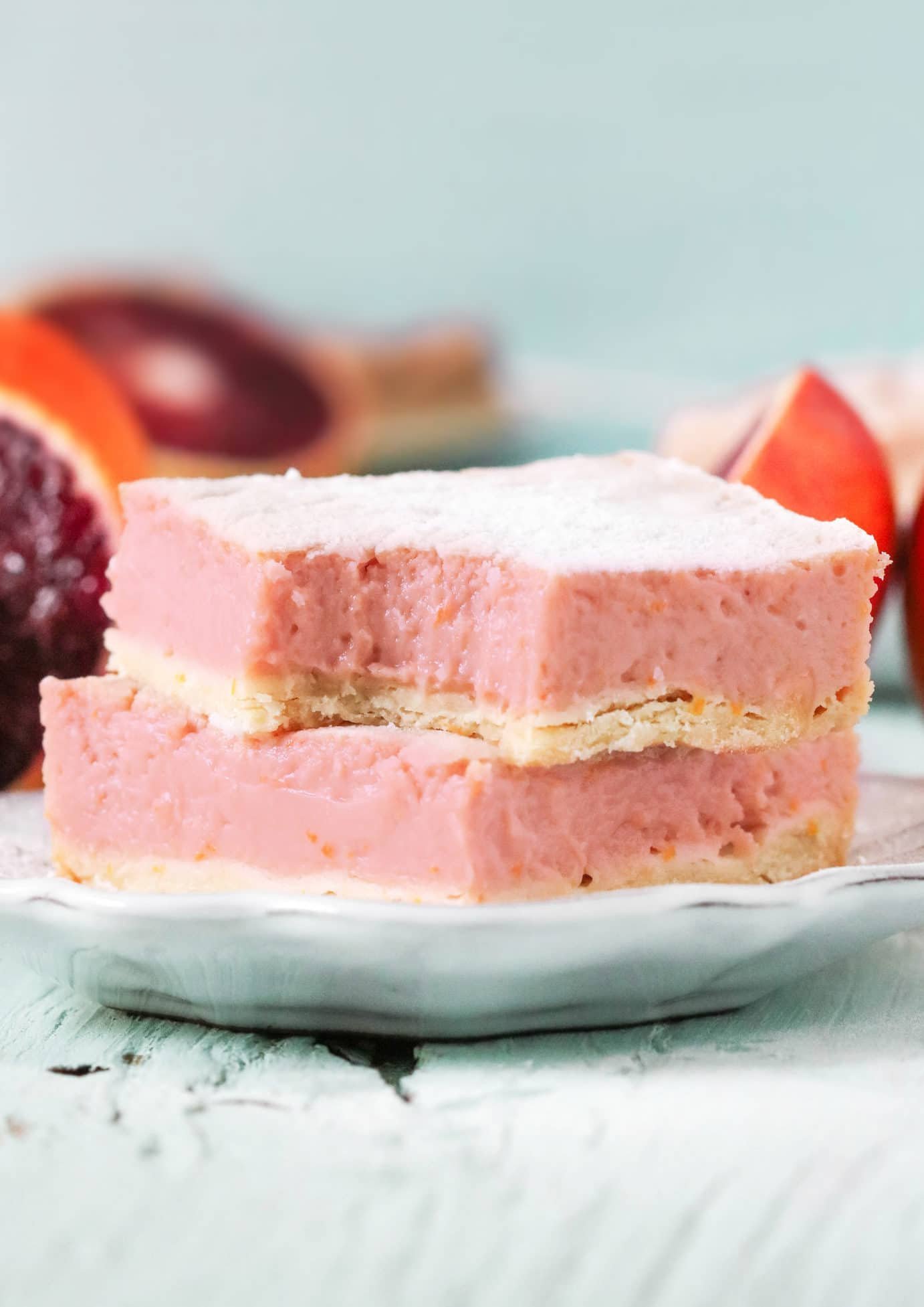 These Blood Orange Bars are perfectly sweet, tart, refreshing, and delicious, you'd never know they're guilt-free! Lower calorie and lower fat than the original, and made without any added butter, oil, or sugar. If you like Lemon Bars, you'll love this recipe! Healthy dessert recipes at the Desserts With Benefits Blog (www.DessertsWithBenefits.com)