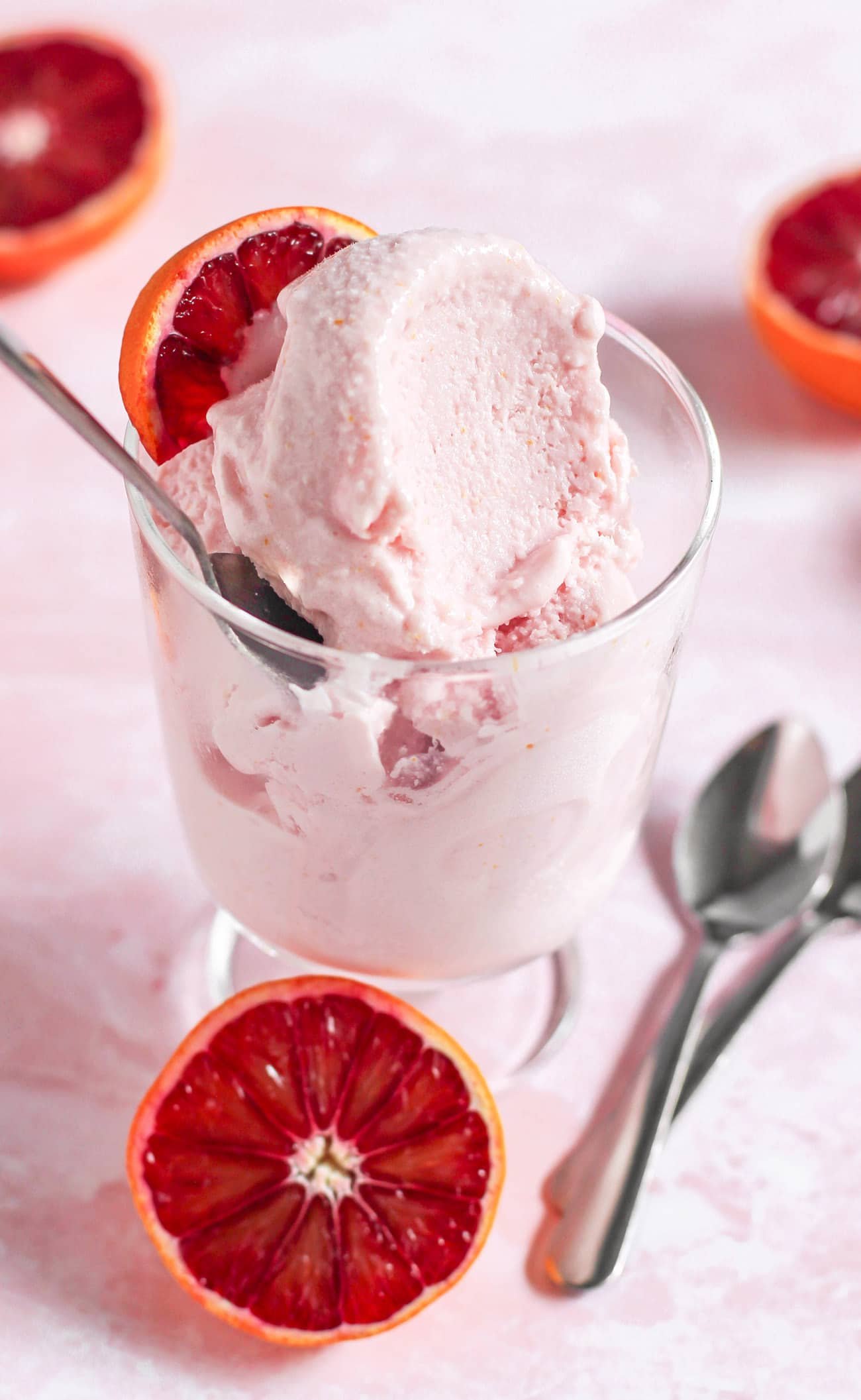 This 5-ingredient Blood Orange Ice Cream is sweet, tart, citrusy, and oh so satisfying. No need for the heavy cream, white sugar, artificial flavors, and artificial food dyes! This is the perfect ice cream to indulge in, guilt-free! Compared to store-bought ice cream, this is lower in calories, fat, and sugar, and higher in protein! This 5-ingredient Blood Orange Ice Cream is sweet, tart, citrusy, and oh so satisfying. No need for the heavy cream, white sugar, artificial flavors, and artificial food dyes! This is the perfect ice cream to indulge in, guilt-free! Compared to store-bought ice cream, this is lower in calories, fat, and sugar, and higher in protein!