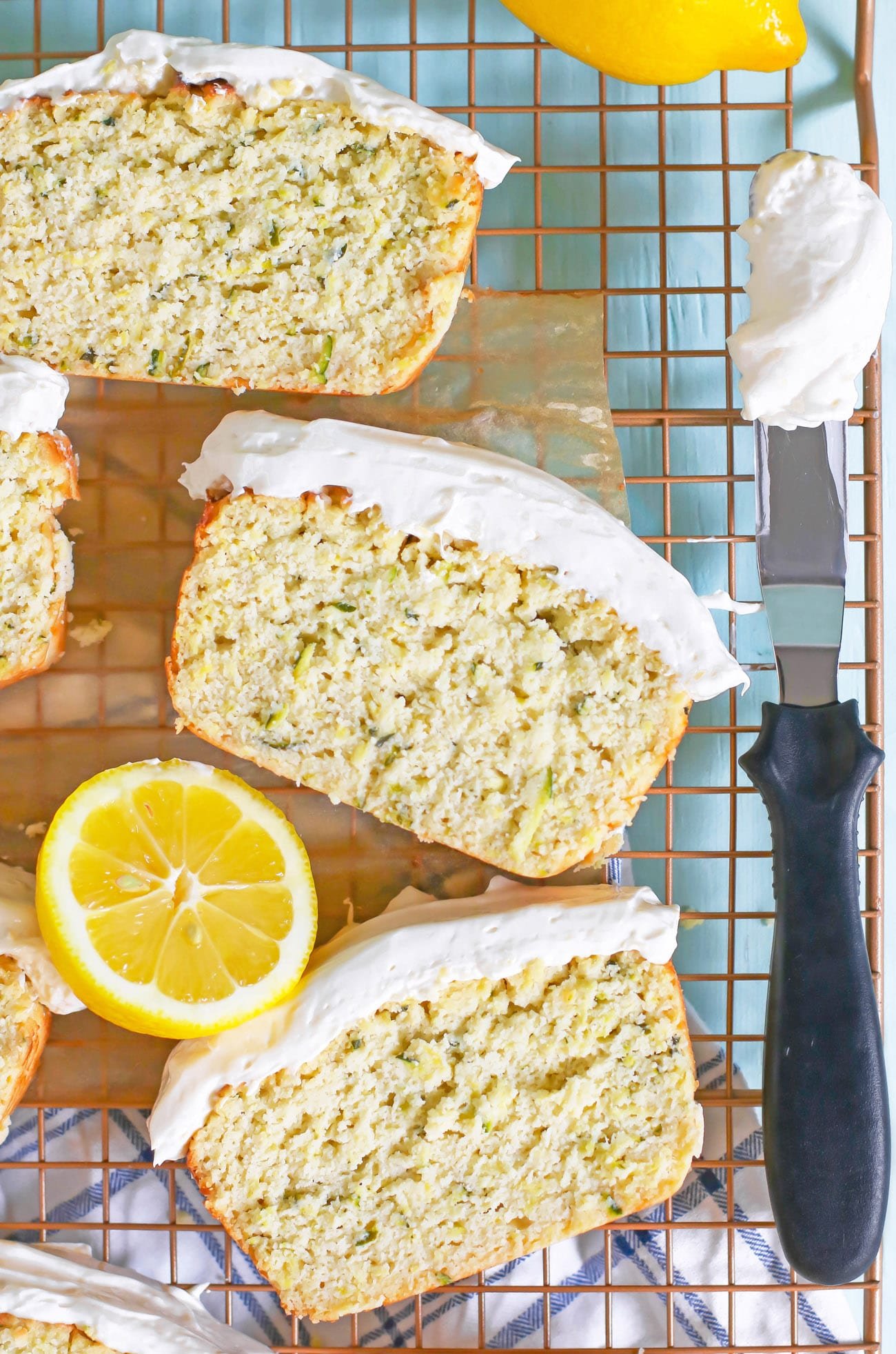 This low-carb and gluten-free Zucchini Bread is super easy to make and uses simple ingredients, such as coconut flour — a paleo, keto-friendly, gluten-free flour — and Greek yogurt — which is sugar free and high protein! It’s soft and moist, just like Banana Bread, but contains a vegetable you can’t taste! If you grow your own zucchini, or are looking for new recipes using zucchini, you’ve gotta give this healthy Zucchini Bread recipe a try!