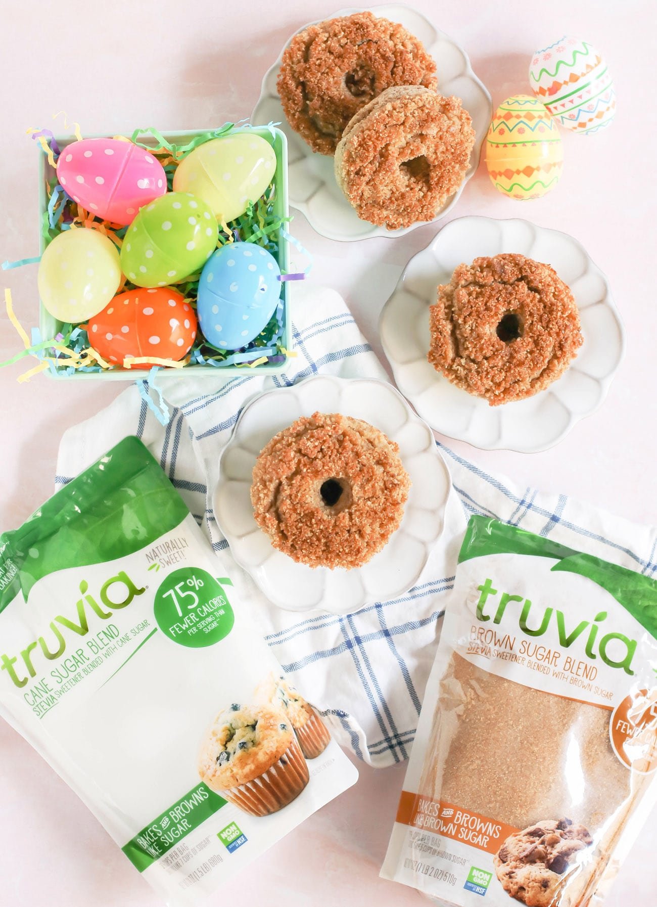 These easy Baked Crumb Donuts are rich, sweet, full of vanilla flavor, and a coffee cake-like crumb topping. Every bite is buttery and satisfying. You'd never know these donuts are gluten free, high in protein and fiber, and made with less sugar than regular donuts, thanks to using the Truvia Cane Sugar Blend and Truvia Brown Sugar Blend!
