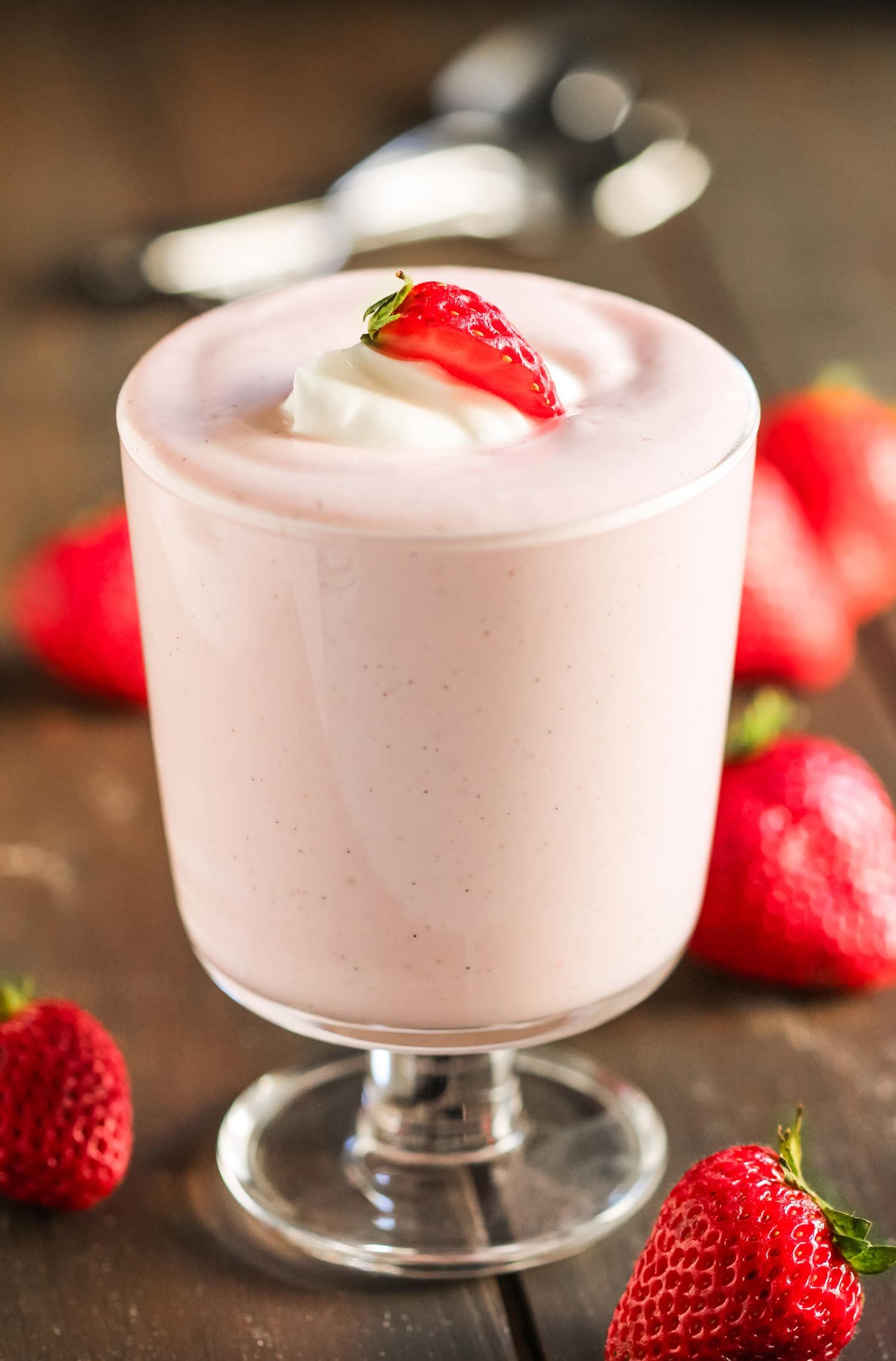 This Healthy Strawberry Cheesecake Dip is creamy, smooth, satisfying and jam-packed full of fresh strawberry puree. It has all the flavor of a decadent cheesecake, just in the form of a dip! And the best part? It has only 70 calories, 1.5g fat, and no added sugar! Perfect for dipping whole grain graham crackers, juicy strawberries, or spoons alone. Healthy Dessert Recipes with sugar free, low calorie, low fat, low carb, high protein, gluten free, dairy free, vegan, and raw options at the Desserts With Benefits Blog (www.DessertsWithBenefits.com) Healthy Strawberry Cheesecake Dip (70 calories)