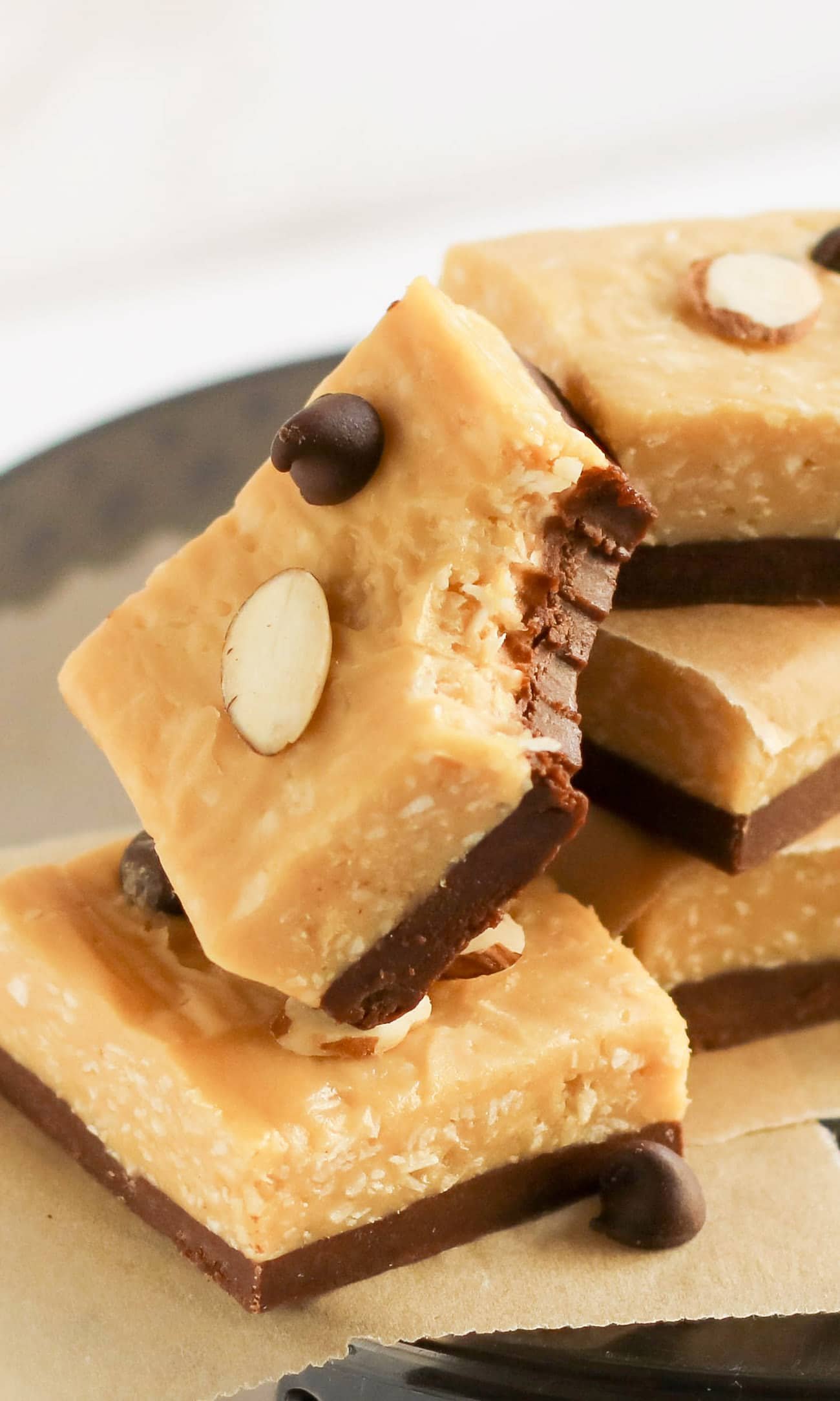 This Almond Joy Candy Fudge is healthy but doesn't taste healthy at all. It's just as soft, sweet and chewy as the original, but without the white sugar, hydrogenated oil, preservatives, and artificial ingredients. This fudge is refined sugar free, high fiber, high protein, and gluten free too!