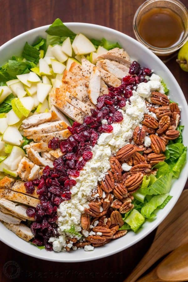 Chopped Chicken Salad Served in strips of chicken, pears, craisins, feta and pecans over a bed or romaine lettuce with balsamic vinaigrette on the side