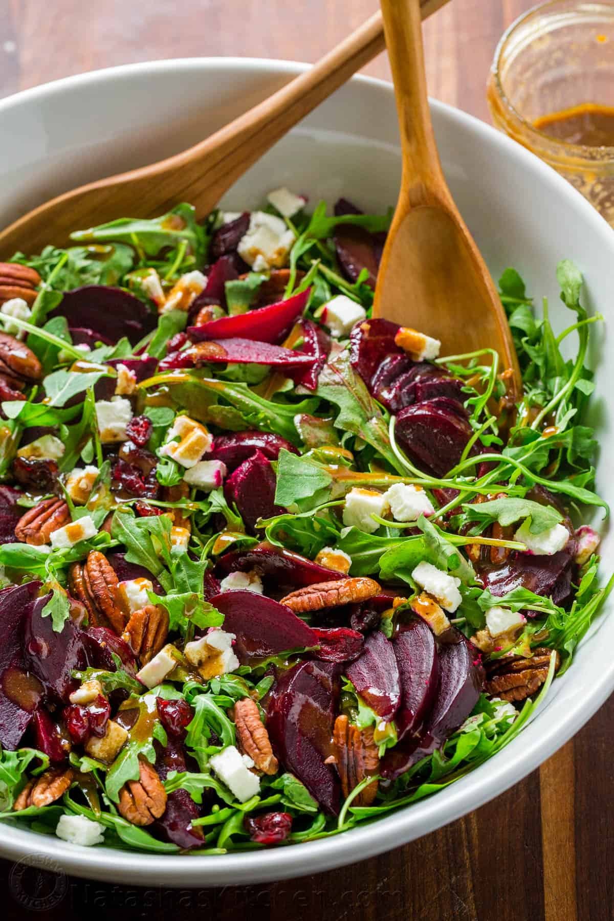 This beet salad recipe tastes fancy but is SO EASY to make. A show-stopping and flavorful salad that is impressive for holidays, entertaining, or dinner at home. A show-stopping and flavorful beet salad with arugula with balsamic vinaigrette. It’s gluten free, vegetarian and perfect for entertaining.