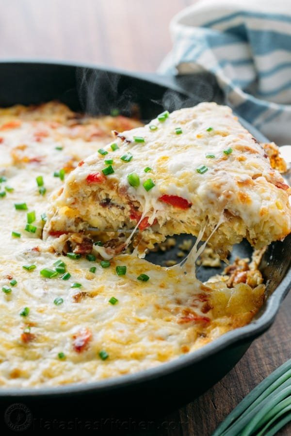 This breakfast casserole goes from stove to oven in one pan. Under the gooey cheesy crust, it's loaded with bacon, hash browns and of course, more cheese!