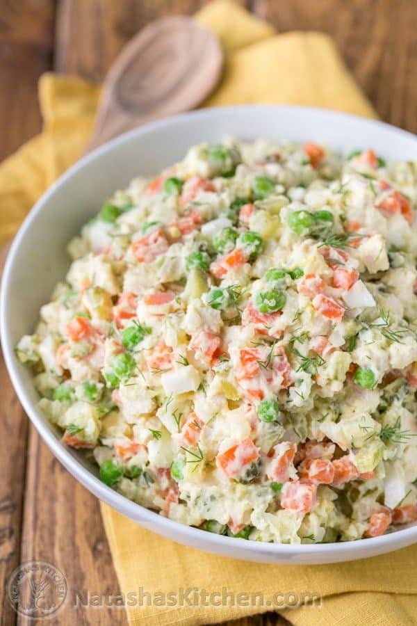 The most exciting potato salad you'll try! This chicken olivye is a favorite at church potlucks. | natashaskitchen.com