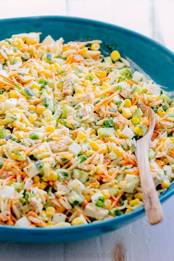 This chicken pasta salad is loaded, hearty and satisfying. The creamy lemon dill dressing adds fresh amazing flavor. This pasta salad is so tasty! | natashaskitchen.com