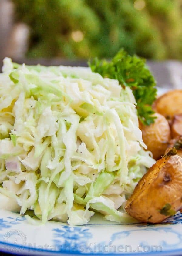 A plate with creamy apple coleslaw 