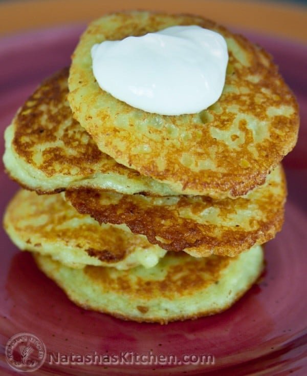 These potato pancakes have finely grated, raw potatoes and onion. It's a classic Ukrainian dish called Deruny. Our moms still make these deruny regularly.